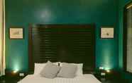 Kamar Tidur 3 Sunrise Phuket Homestay