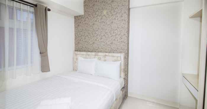 Bedroom  2BR at Green Pramuka City Apartment By Travelio