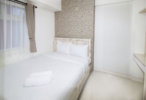 Bedroom  2BR at Green Pramuka City Apartment By Travelio