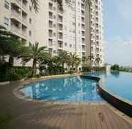 Kolam Renang 4 Comfy Studio Apartment at Mustika Golf By Travelio