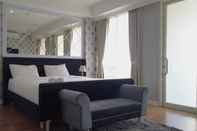 Kamar Tidur Deluxe 3BR at Landmark Residence Apartment with City View By Travelio