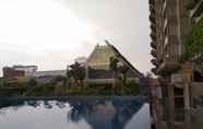 Kolam Renang 3 Deluxe 3BR at Landmark Residence Apartment with City View By Travelio