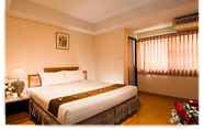 Kamar Tidur 4 OYO 75385 Hotel Win Long