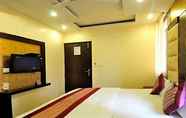Bedroom 6 Hotel Aman International