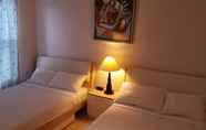 Bilik Tidur 2 Dundas Apartments & Suites