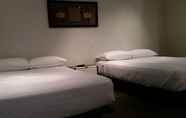 Bilik Tidur 4 Dundas Apartments & Suites