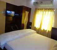 Phòng ngủ 2 Hotel Om International