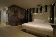 Kamar Tidur U & Songdo Hotel