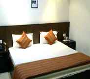 Bedroom 6 Hotel Atithi