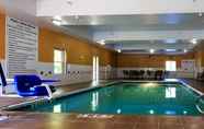 Swimming Pool 3 Holiday Inn Express & Suites HINESVILLE EAST - FORT STEWART, an IHG Hotel