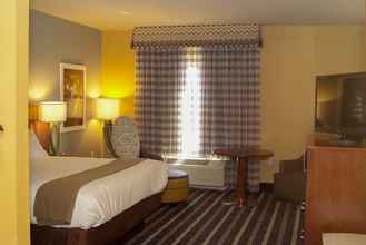 ห้องนอน 4 Holiday Inn Express & Suites PERRY-NATIONAL FAIRGROUND AREA, an IHG Hotel