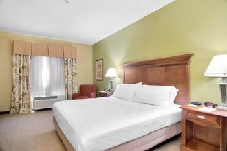 Bedroom 4 Holiday Inn Express & Suites DFW WEST - HURST by IHG, an IHG Hotel