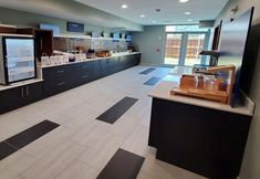 레스토랑 3 Holiday Inn Express & Suites ARLINGTON NORTH – STADIUM AREA by IHG, an IHG Hotel