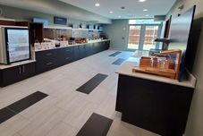 레스토랑 Holiday Inn Express & Suites ARLINGTON NORTH – STADIUM AREA by IHG, an IHG Hotel