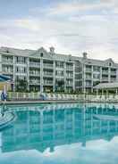 View of property building from pool. Holiday Inn Club Vacations HILL COUNTRY RESORT CANYON LK, an IHG Hotel