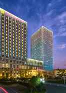 Hotel Exterior Night View คราวน์พลาซ่า เขตพัฒนาอู่ฮั่น - เครือโรงแรมไอเอชจี