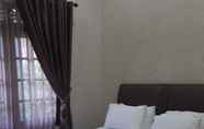 Bedroom 3 Hotel Ningrat Syariah near Alun Alun Bangkalan