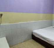 Bedroom 5 Nadiesti Homestay Samarinda Syariah
