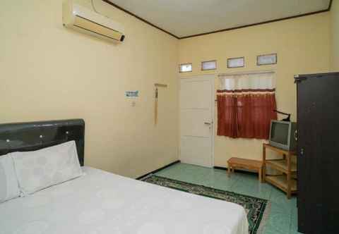 Bedroom Homestay Marlin Syariah at Desa Wisata Pulau Untung Jawa