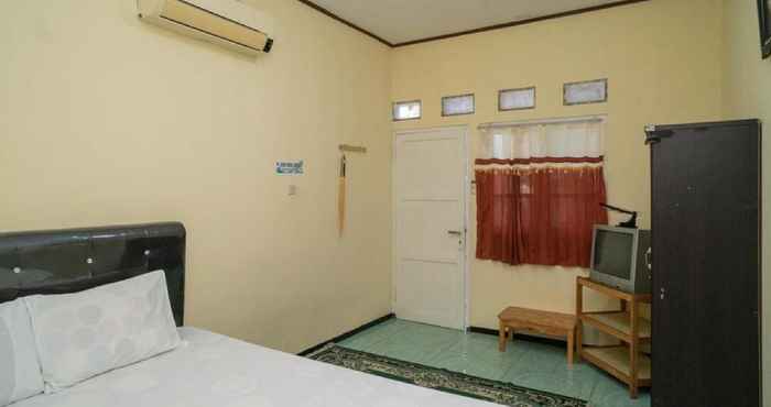 Bedroom Homestay Marlin Syariah at Desa Wisata Pulau Untung Jawa