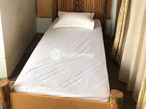 Kamar Tidur 4 Friendjoss Homestay Laugumba