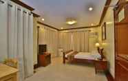 Bedroom 2 Crown Regency Suites