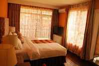 Bedroom Michael's Inn & Suites