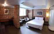 Kamar Tidur 4 Wing Hotel