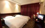 Bedroom 4 Jinwang Business Hotel
