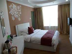 Kamar Tidur 4 Yuejia Business Hotel