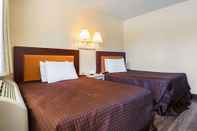Bedroom Rodeway Inn Kissimmee Maingate West (FORMERLY Motel 6 Orlando Kissimmee Main Gate West