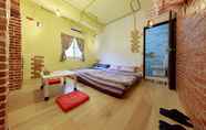 Kamar Tidur 4 Roaming Ancient Bed and Breakfast