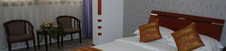 Bedroom 4 Shenjia Business Hotel