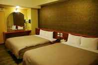 Kamar Tidur Happy Business Hotel