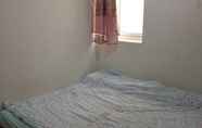 Kamar Tidur 4 Phd's Guest House I