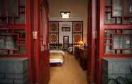 Kamar Tidur 7 Tiananmen Yier Guesthouse