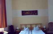 Bedroom 3 Hotel Pension Uhland