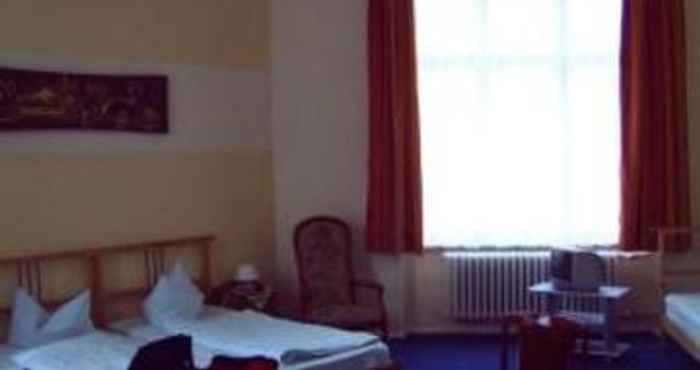 Bedroom Hotel Pension Uhland