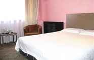 Kamar Tidur 3 Hejia Business Hotel