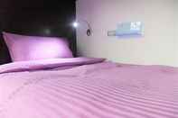 Kamar Tidur Green World Hostel