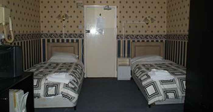 Kamar Tidur The Nottinghill Guest House