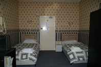 Kamar Tidur The Nottinghill Guest House