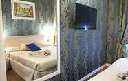 Kamar Tidur 5 Prestige Guest House