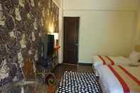 Kamar Tidur Famous Painting Town B&B