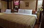 Kamar Tidur 7 Many Flower Business Hotel