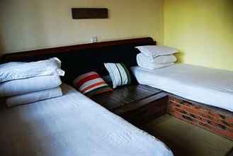 Bedroom 4 Wada Hostel In Guilin