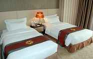 Kamar Tidur 7 Titan Times Hotel