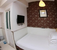 Kamar Tidur 2 Kam Fung Guest House