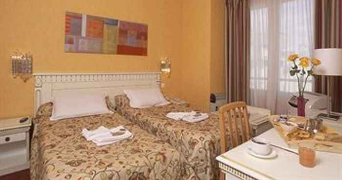 Phòng ngủ Comfort Hotel Royal Aboukir