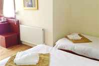 Kamar Tidur Camden Town Hotel